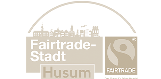 Logo eines Sand Partners mit dem Text Fairtrade-Stadt Husum