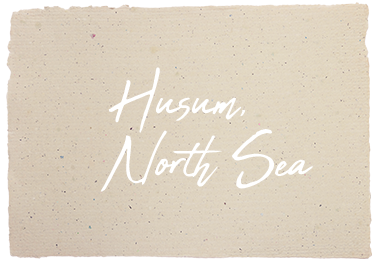Cursive writing on paper with the text 